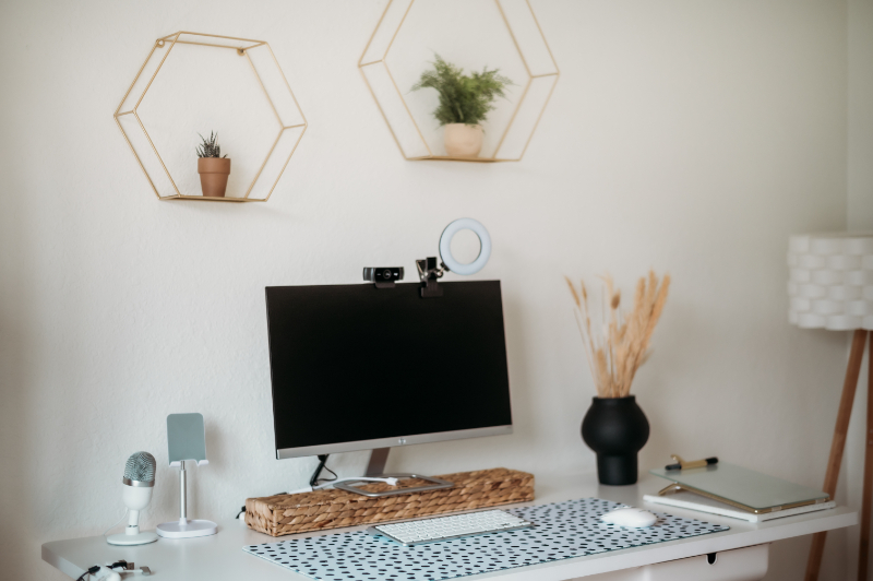 modern desk area with laptop and accessories